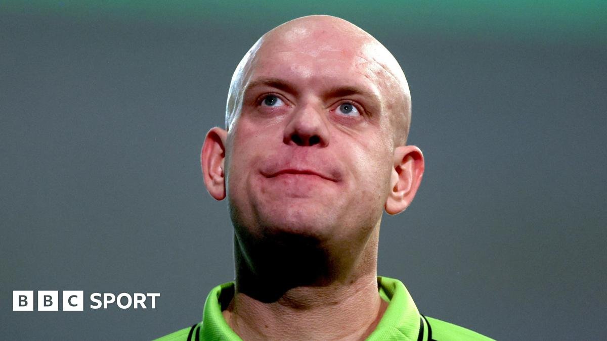 Michael van Gerwen loses to Damon Heta on day one of World Masters