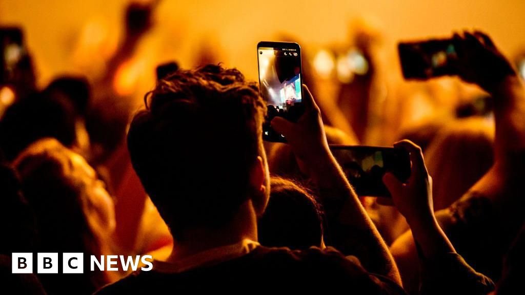 Should smartphones be locked away at gigs and in schools?