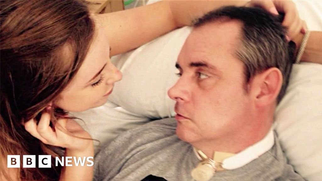 Twelve men charged with manslaughter of football fan